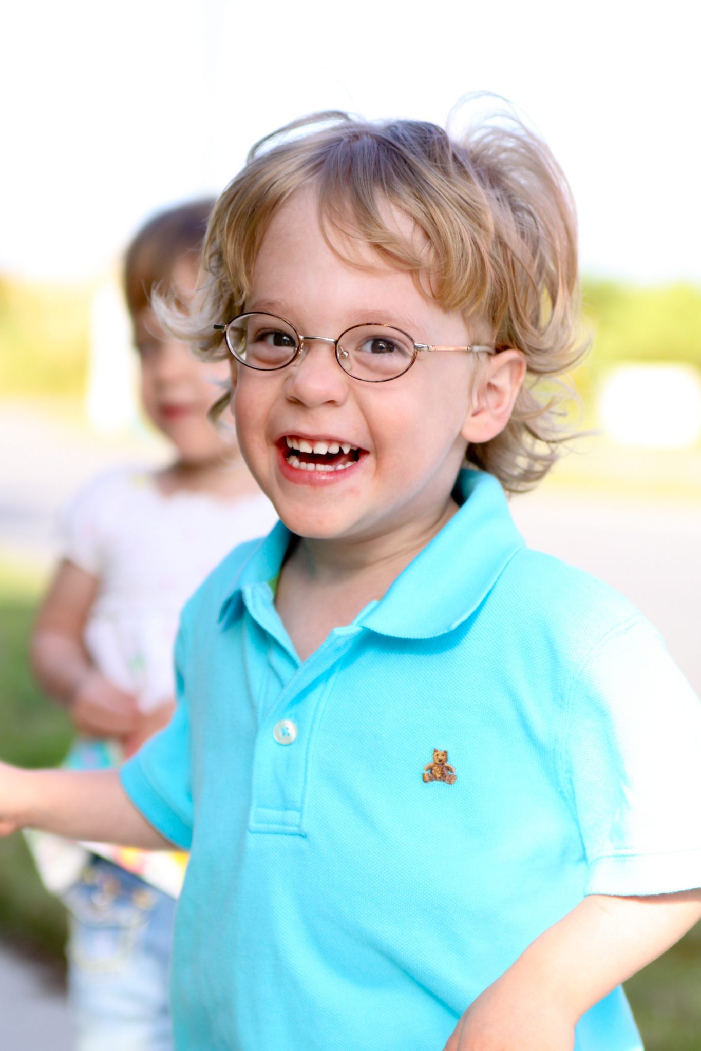 beautiful children smiling with bright blue eyes